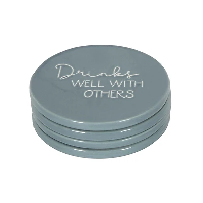 Ensemble de quatre dessous de verre en porcelaine Linden avec fini bleu dictons divers
