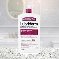 Lotion Lubriderm Advanced Moisture Therapy - Vitamine E, provitamine B5, procéramides, peau sèche, sans parfum 710 ml