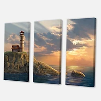 Designart Phare sur une falaise côtière rocheuse au coucher du soleil Art mural sur toile