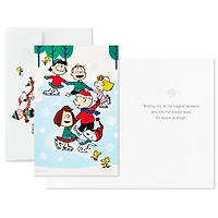 Boîte de 24 cartes de Noël Connections de Hallmark (La bande Peanuts fait du patin à glace)