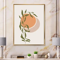 Designart Soleil et lune orange abstraits avec des feuilles tropicales ART MURAL À CADRE FLOTTÉ