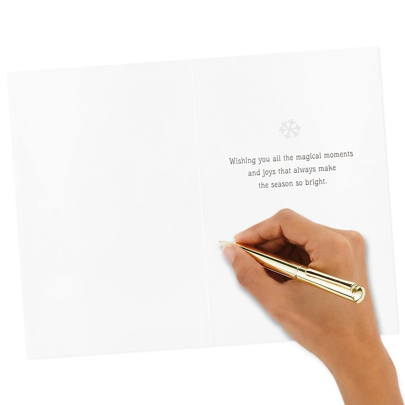 Boîte de 24 cartes de Noël Connections de Hallmark (La bande Peanuts fait du patin à glace)