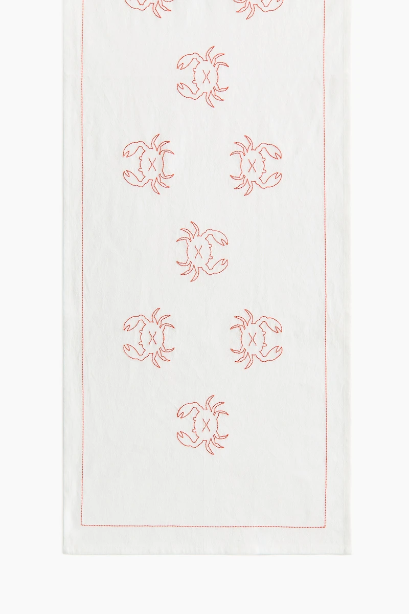 Chemin de table en lin mélangé avec motifs brodés