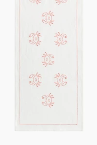 Chemin de table en lin mélangé avec motifs brodés