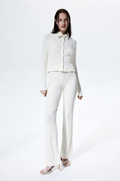 Pantalon texturé et évasé