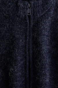 Chandail à fermeture éclair en tricot côtelé