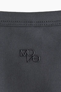 Cropped sports top with DryMove™