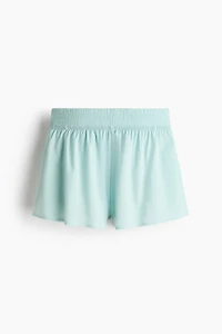 Short de sport double épaisseur