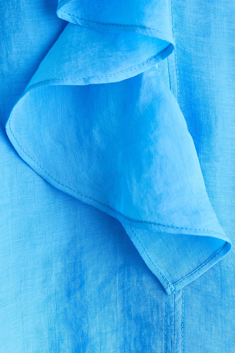 Blouse à volant en lyocell mélangé