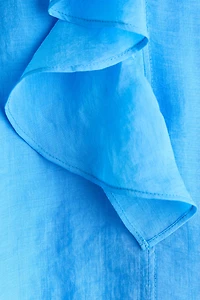 Blouse à volant en lyocell mélangé