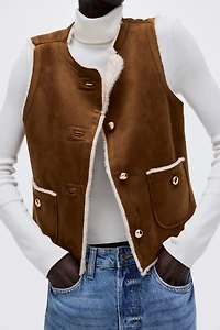 Veste sans manches doublée de tissu peluche