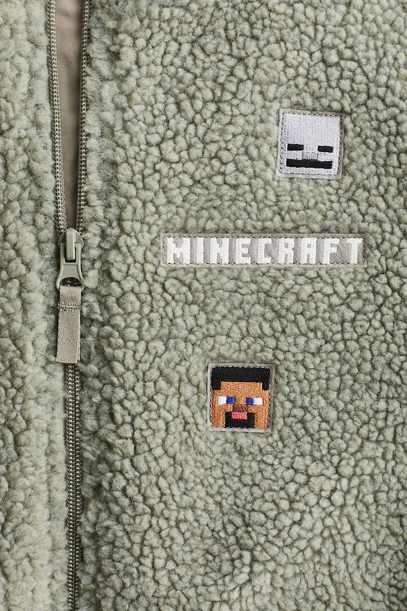 Veste en polar avec appliqués