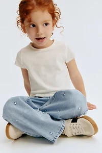 Jean à jambes larges avec motifs