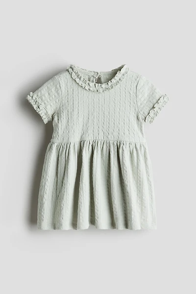 Robe volantée en jersey jacquard