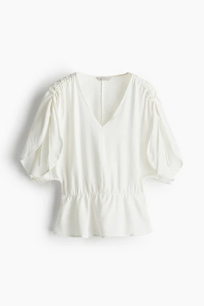 Blouse avec cordons de serrage