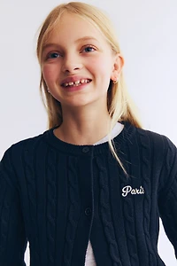 Gilet en tricot torsadé