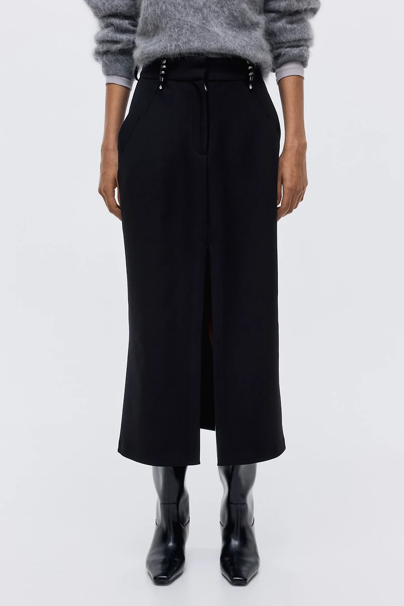 Jupe droite avec rivets