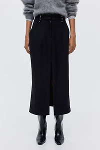 Jupe droite avec rivets