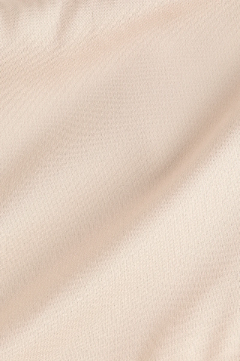 Pantalon en satin avec jupe superposée