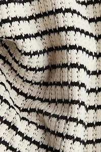 Combinaison en tricot pointelle