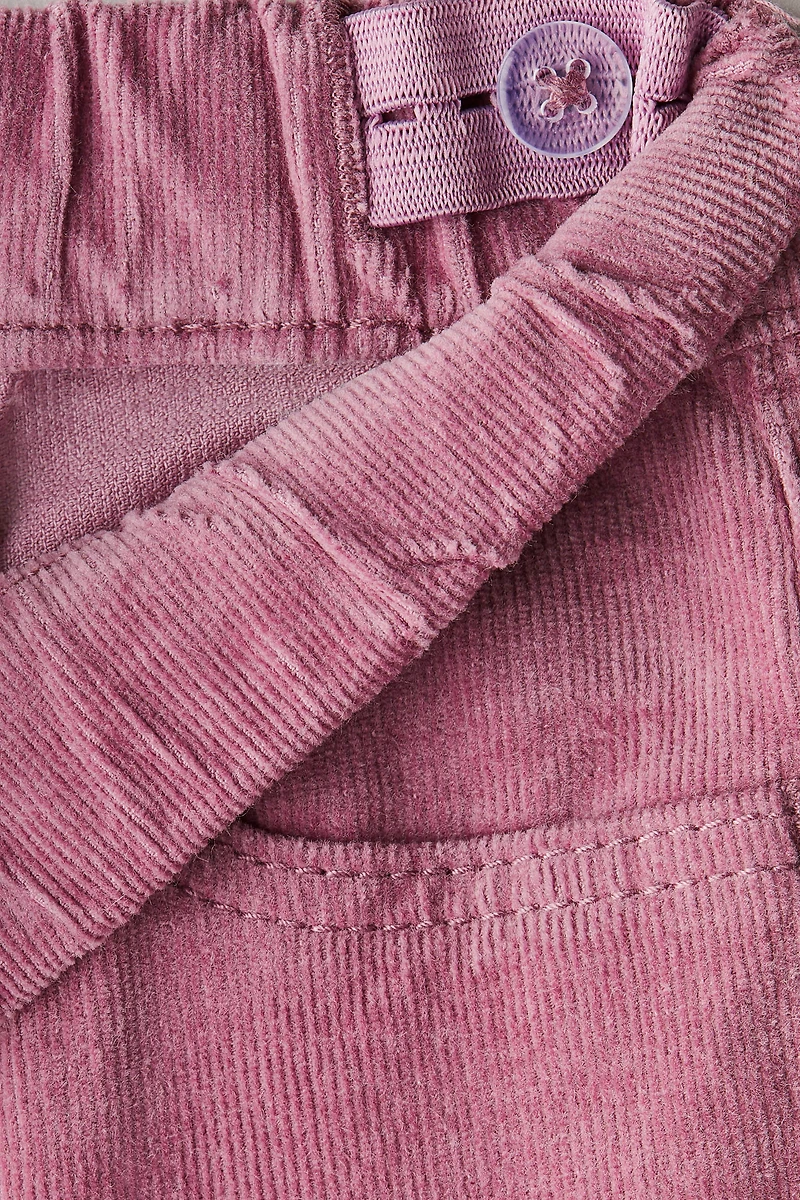 Pantalon ultra-moulant évasé en velours côtelé