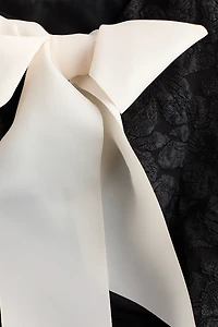 Bow-Detail Peplum Top