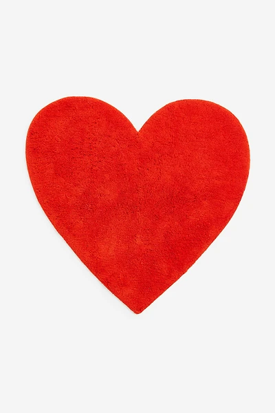 Tapis touffeté en forme de cœur