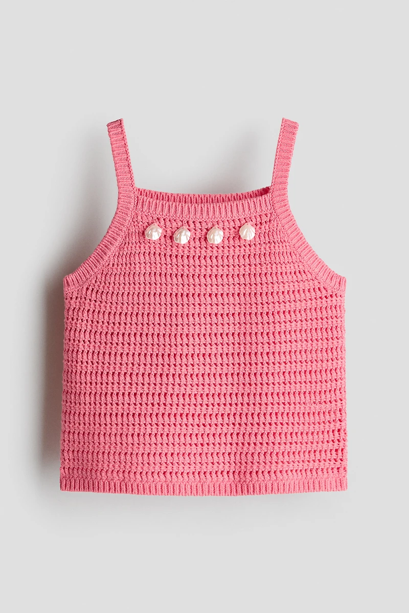 Haut ornementé en tricot