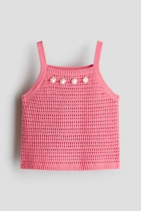 Haut ornementé en tricot