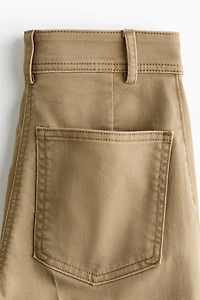 Flared ankle-length trousers