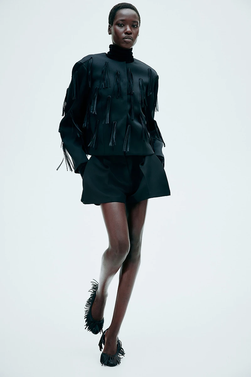 Veste frangée