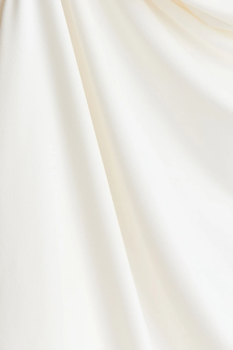 Draped Asymmetric Top