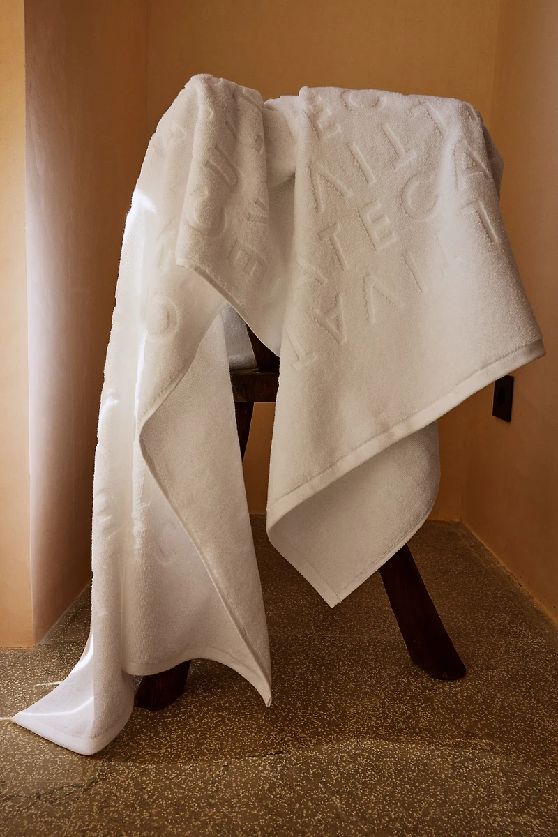 Serviette de bain en coton éponge