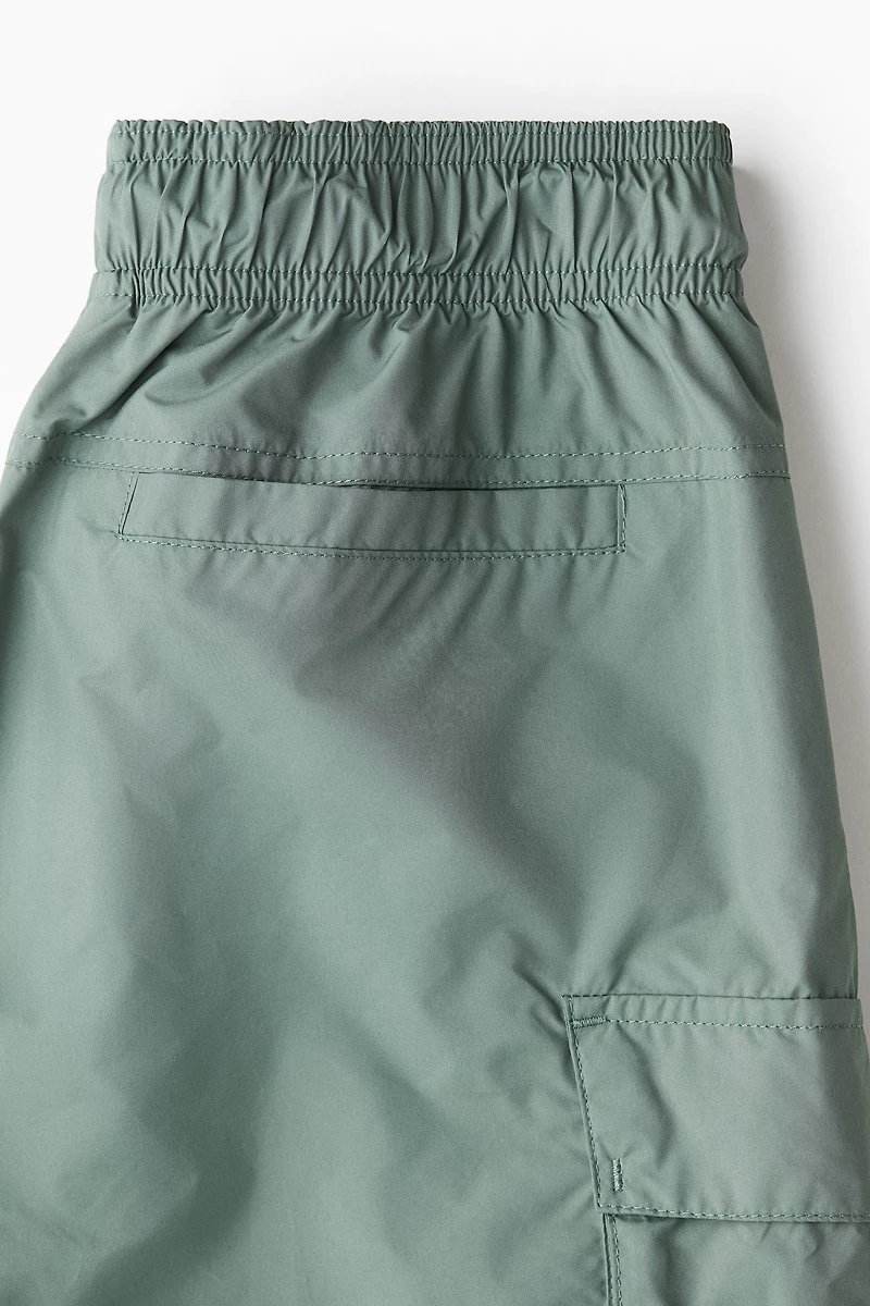 Short de sport long style cargo