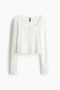 Haut à encolure dégagée