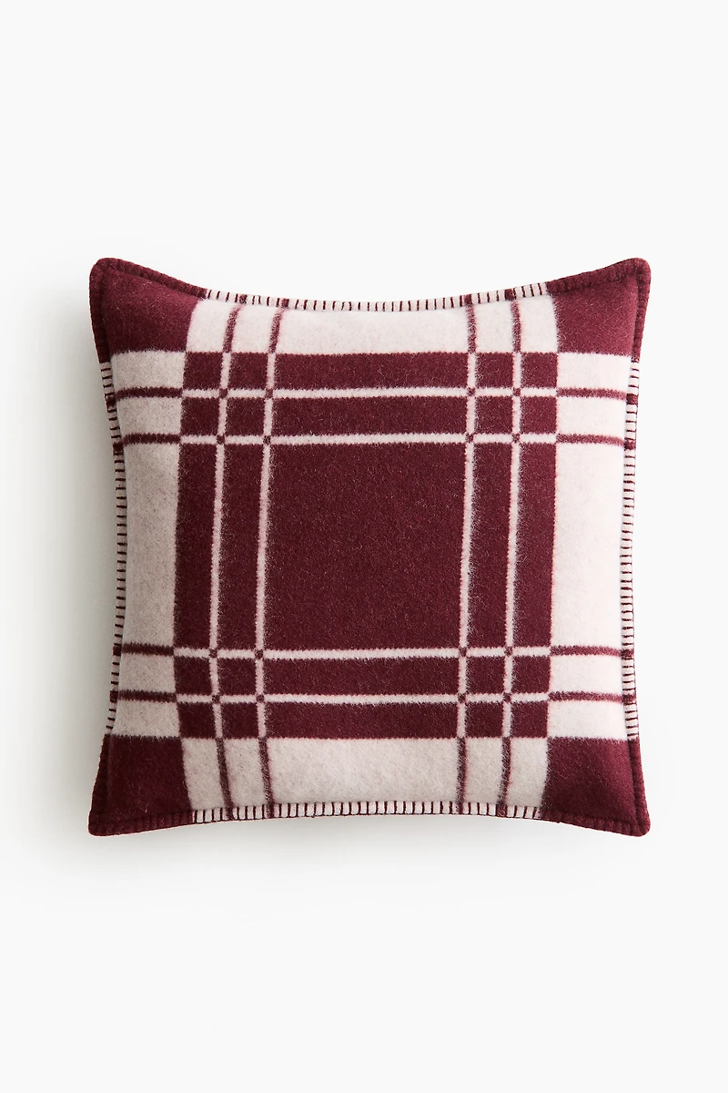 Housse de coussin en laine mélangée