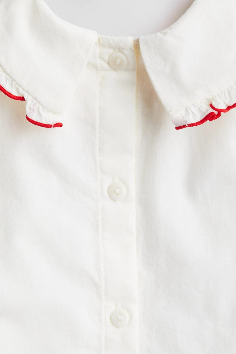 Blouse en coton avec détails brodés