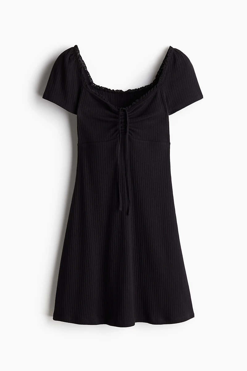Lace-Trimmed Dress with Flared Skirt