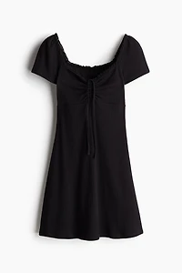 Lace-Trimmed Dress with Flared Skirt