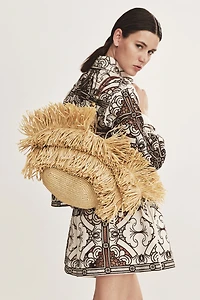 Sac de magasinage frangé en paille