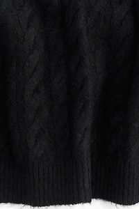Chandail en tricot torsadé