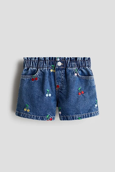 Short en denim à motifs brodés