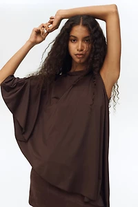Asymmetric Cape Top