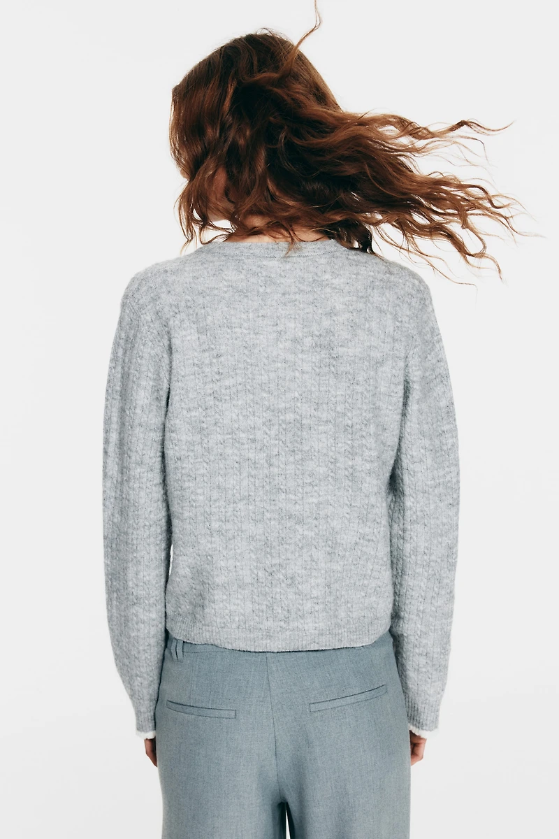 Chandail en tricot torsadé