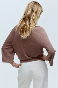 Haut scintillant en tricot fin