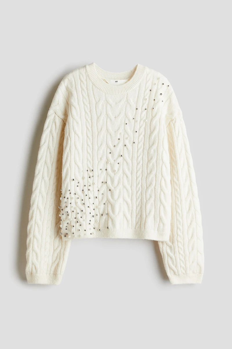 Chandail en tricot torsadé
