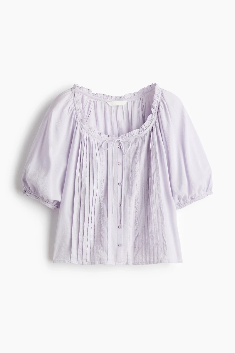Blouse à plis nervurés