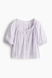 Blouse à plis nervurés