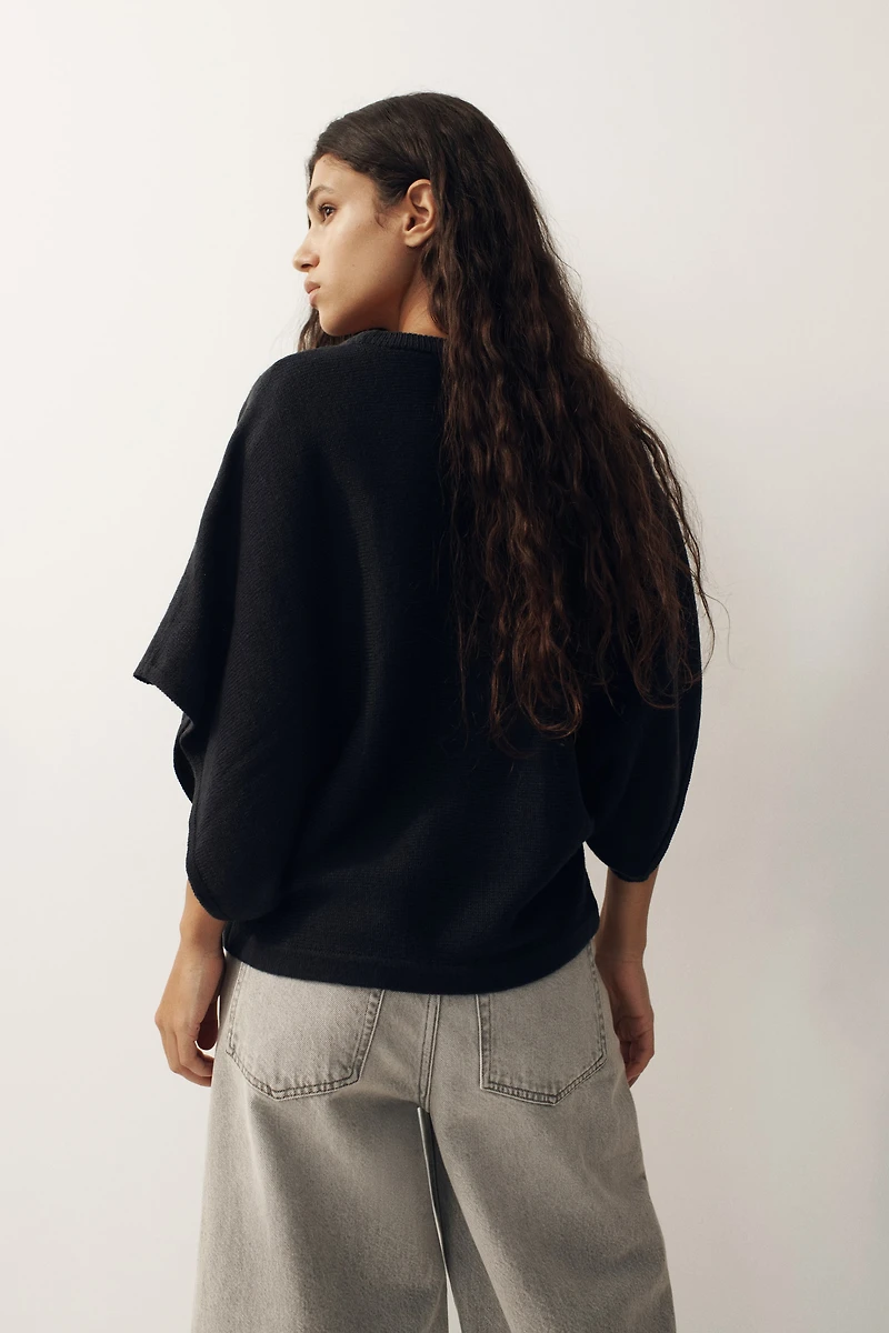 Haut à manches chauve-souris en tricot