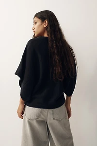 Haut à manches chauve-souris en tricot